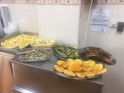 Especialidad en pollos asado hermanos Fernández Ruizen Torrente